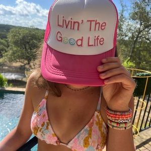 Trucker hat: “Livin’ the good life”